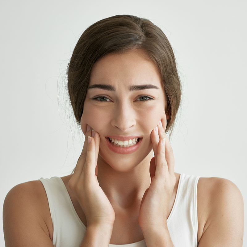 woman-with-jaw-pain woman with jaw pain