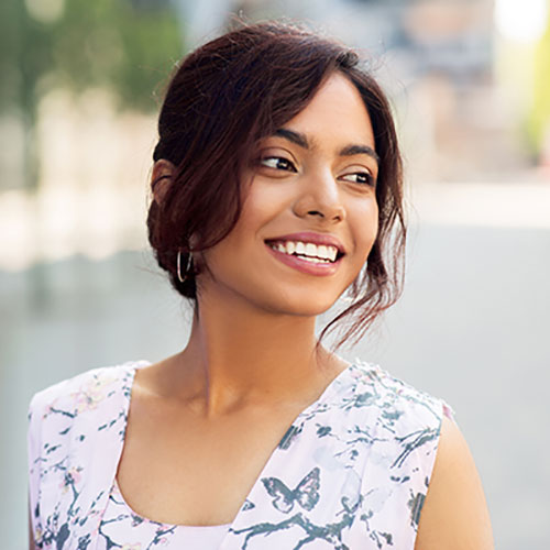 young-woman-with-big-smile-outside woman big smile